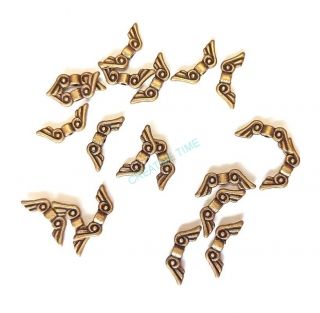 Kovová korálka krídelká 6x16 mm - starobronz - 20 ks